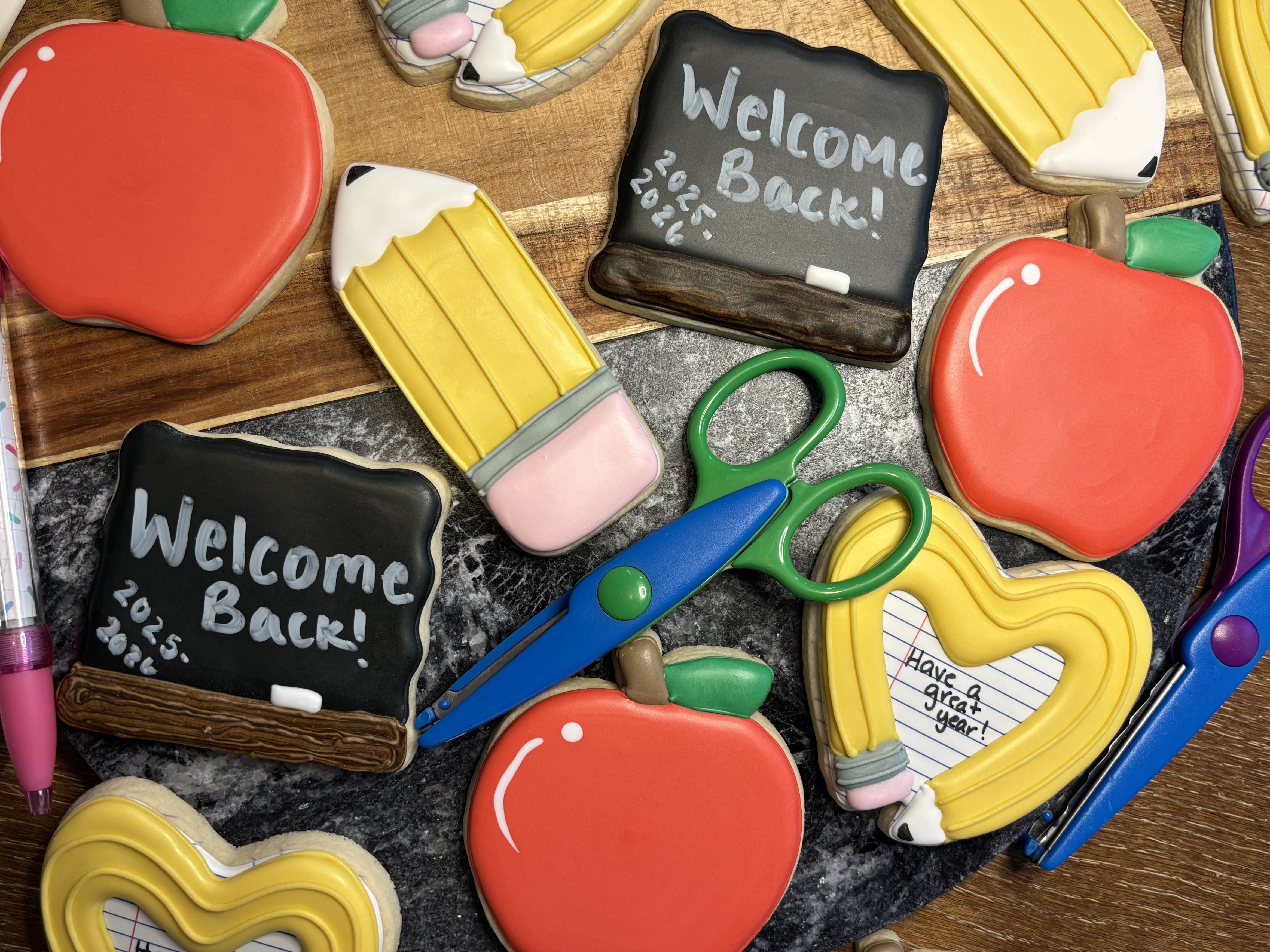 Back to school welcome blackboard pencils apples scissors